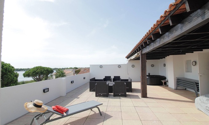 Le Grau-Du-Roi Condo | BEAUTIFUL TRIPLEX OF 145 m² + Solarium of 82 m² with view on the lake