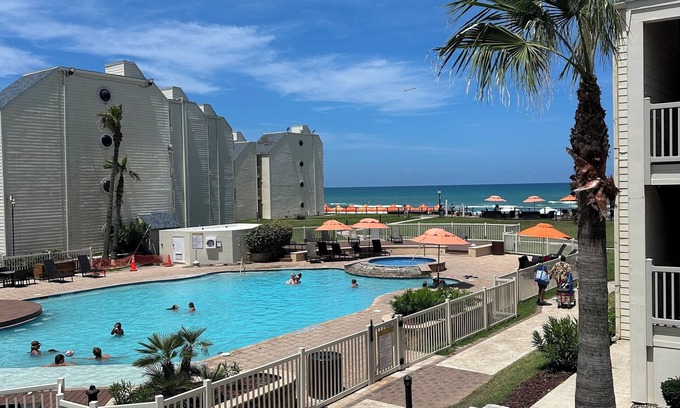 South Padre Island Condo | Beautiful view pool and beachfront 5-bed condo with AC in South Padre Island