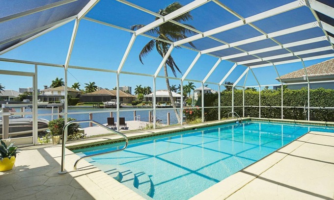 Marco Island House | Beautiful waterfront home with big, private pool close to Tigertail Beach.
