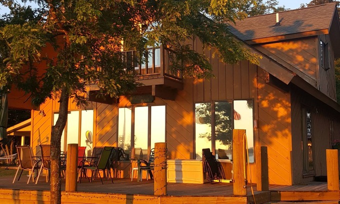 Lake City Ski Chalet | Beautifull beachfront Chalet with large deck facing the water. 50ft from water