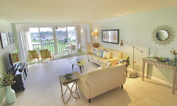 Fort Pierce Condo | Beautifully Renovated Condo - Golf Course Enclosed Balcony View - Oceanfront Community