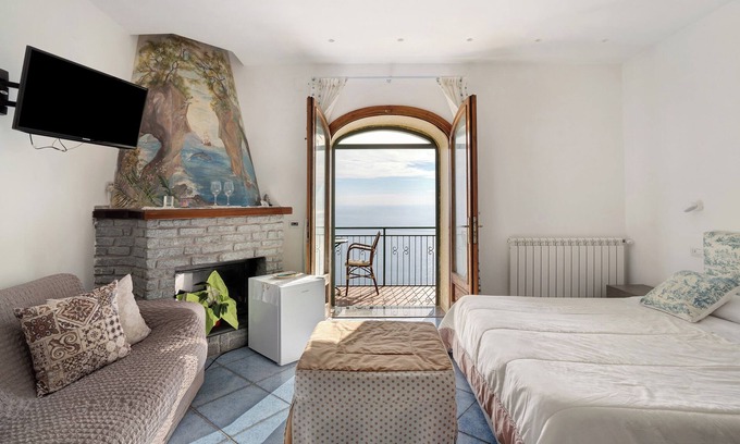 San Michele Bed & Breakfast | Bed and Breakfast 'Camera Fiordo Con Vista Mare' with Sea View, Wi-Fi and Air Conditioning