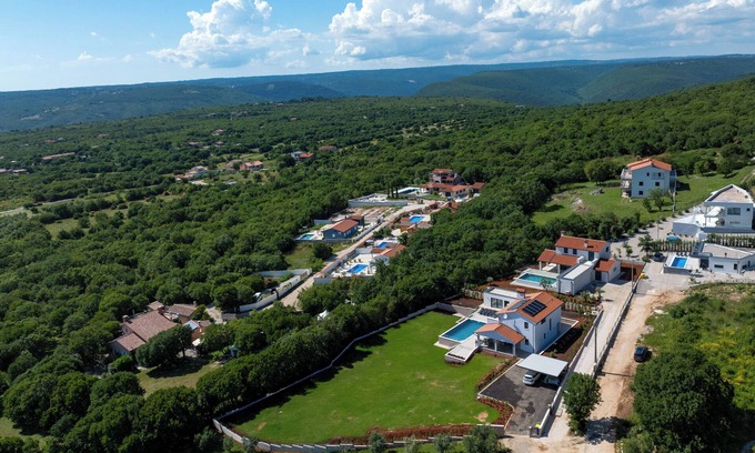 Kapelica Villa | Big pool with counter current swimming system, family and pat friendly.