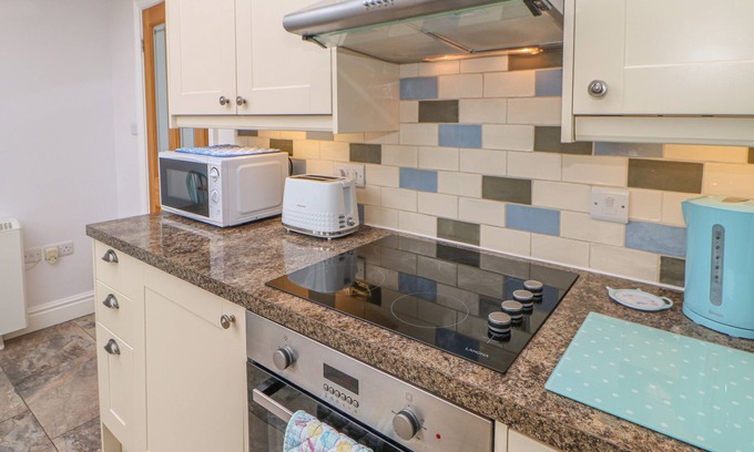 Hudswell Cottage | BLACKSMITH'S COTTAGE, pet friendly, with open fire in Hudswell