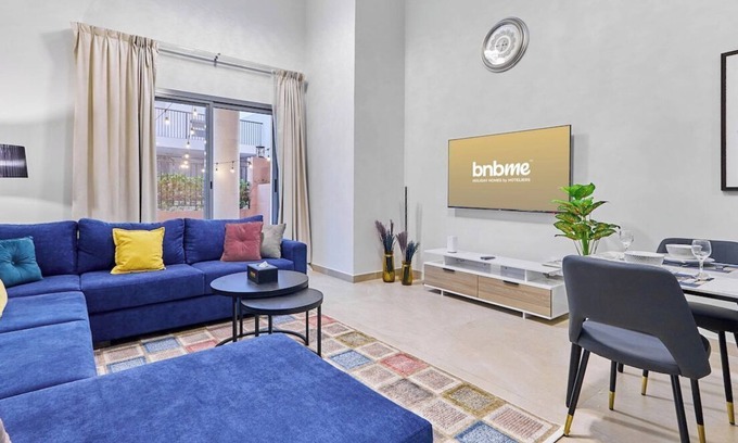 Jumeirah Village Circle Apartment | bnbme | Stylish JVC Apartment | Pool & Private Patio
