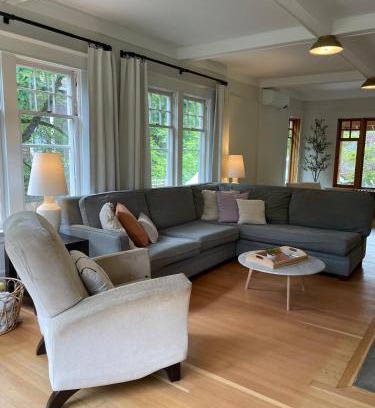 Nelson House | Bright, Spacious Home with Lake & Mountain Views, Walk to Beach