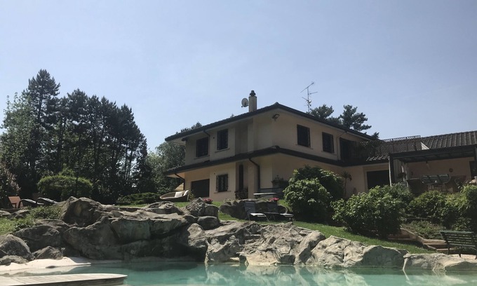 Arcore Apartment | Buen Retiro. An partment in a private villa with park, tennis and swimming pool