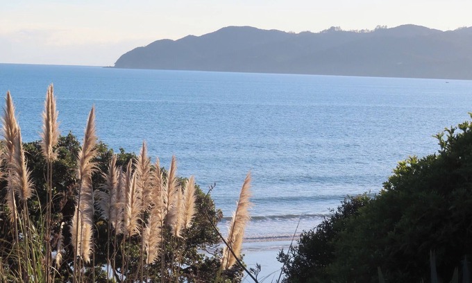 Coopers Beach Apartment | By The Sea Coopers Beach Apartment overlooking the beautiful Bay