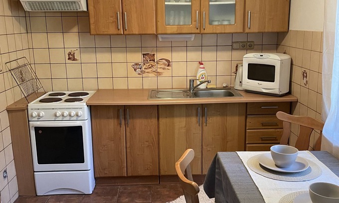 Tatranska Strba Cottage | Cabin in the heart of the Tatry Mountains, surrounded by forest.