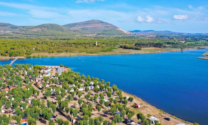 Fertilia House | Camping Village Laguna Blu 4* by Interhome