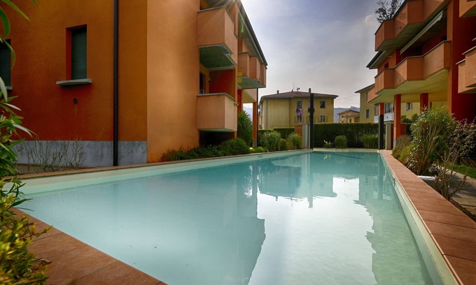 Salo Apartment | Caroni Home, Theater Home - with swimming pool and a near to the center of Salò