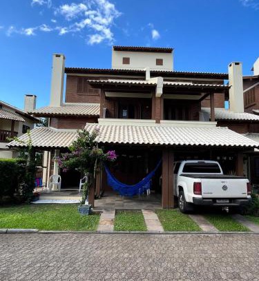 Torres House | Casa 5 Dorm no Condomínio Plaza Guarita em Torres