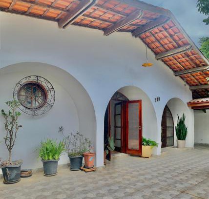 Centro House | Casa Sol Ubatuba - Suítes por Temporada