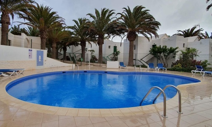 Bahia Calma House | Casa Viola elegant and comfortable bungalow under palm trees by the pool