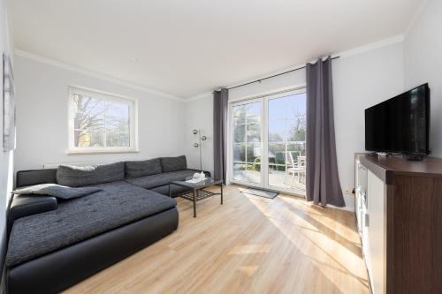 Hohe Dune Apartment | CBlue "Ferienhaus am Yachthafen - Moewe"