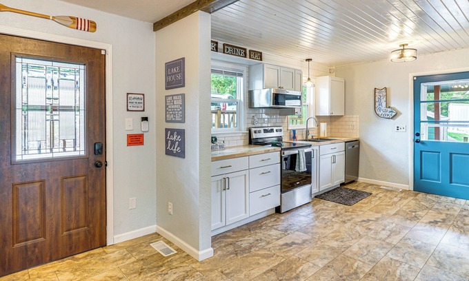 Lake Ozark Cottage | Central Waterfront Home w/Dock in Lake Ozark!