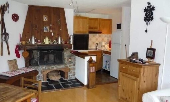 Megeve Apartment | Character apartment with fireplace in residence with summer swimming pool.