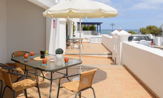 Arrieta Apartment | Charming Apartment Close to Beach with Terrace, Wi-Fi & Gorgeous Views