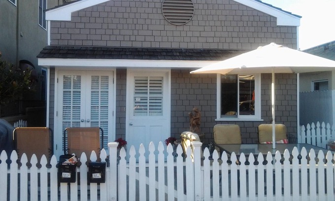 West Newport Cottage | Charming Newport Beach Cottage front house includes middle patio