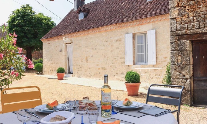 Tourtoirac Cottage | Charming Stone House in Tranquil Hamlet with Fireplace, Terraces, Garden, and Summer Kitchen