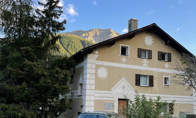 Zuoz Apartment | Chesa Sur En with a view of Piz Mezzaun and Uter