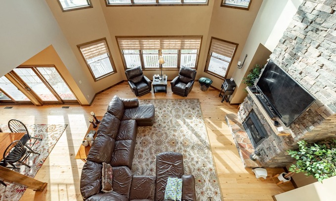 Waterfront Greens House | Chic Lake Access Home w/Hot Tub & Fireplaces