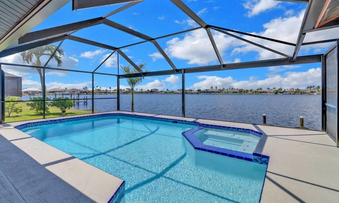 Eight Lakes House | Chic Remodel! Gulf-Access Waterfront! Heated Pool, Kayak, Bikes & Over $125 of Free Daily Activities
