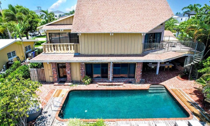 Lauderdale Harbours House | Classic 4/4 Bath Beach Home, 8 beds, Heated Pool, Ocean Access Canal, Dock