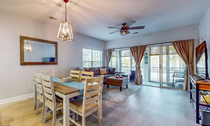 Sea Trail Condo | Coastal Villa with golf course view and shared pool access