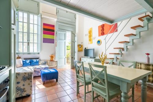 Calambrone Apartment | Colors House On The Beach by Pleiades Home