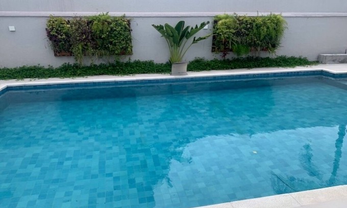 Jardim Virginia House | Comfortable house with 4 suites in a luxury condominium in Guaruja