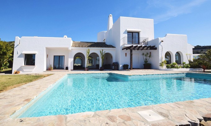 Atlanterra Ski Chalet | Comfortable villa in Cala de los Alemanes, Mediterranean style.