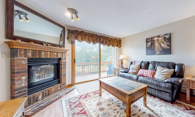 Lincoln Condo | Comfy condo with spacious deck, fast WiFi, fireplace, indoor & outdoor pools