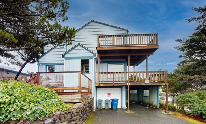 Newport House | Comfy duplex with peekaboo ocean views, private hot tub, & easy beach access