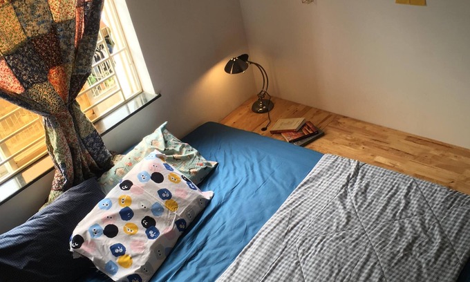 Ben Nghe Apartment | comfy room in a design studio