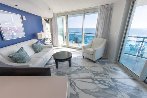 Downtown Myrtle Beach Apartment | Corner condo w 180 ocean views & pools