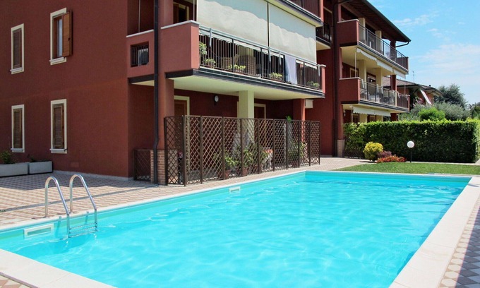 Lugana Apartment | Cosy apartment for 4 guests with pool, WIFI, A/C, TV and balcony
