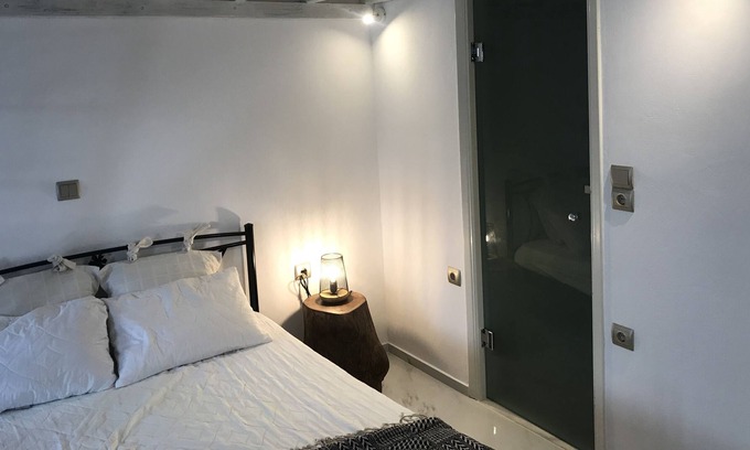 Tinos Town House | Cozy and minimal traditional home with privacy, a great yard and pool!