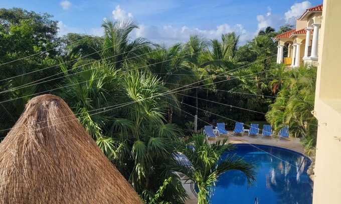 Puerto Aventuras Condo | Cozy and well-appointed condo with large saltwater pool!