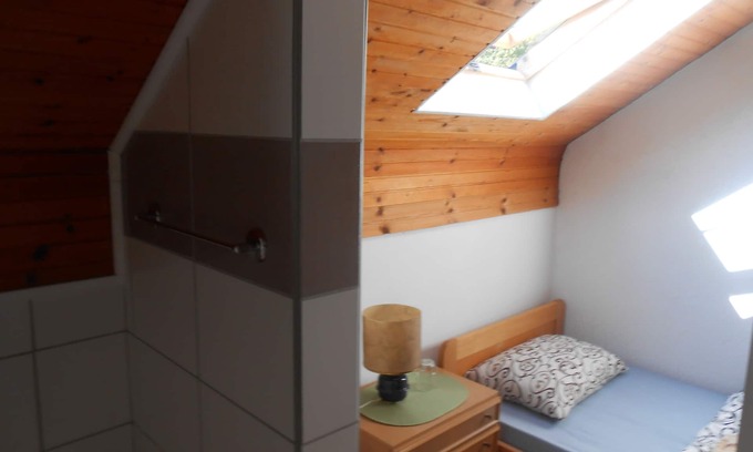 Jezerce House | Cozy attic room