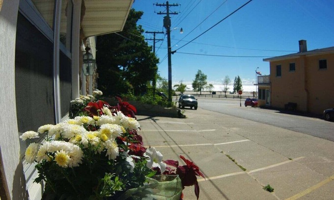 Grand Haven Condo | Cozy Beachside Unit across from the State Beach!