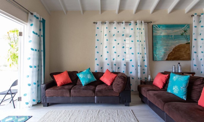Fitts Village House | Cozy Caribbean Getaway across from Beach