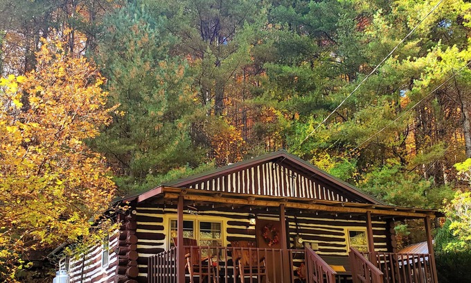 Spruce Pine Cabin | Cozy Hand Built Log Cabin Rocking Chair Porch King Bed