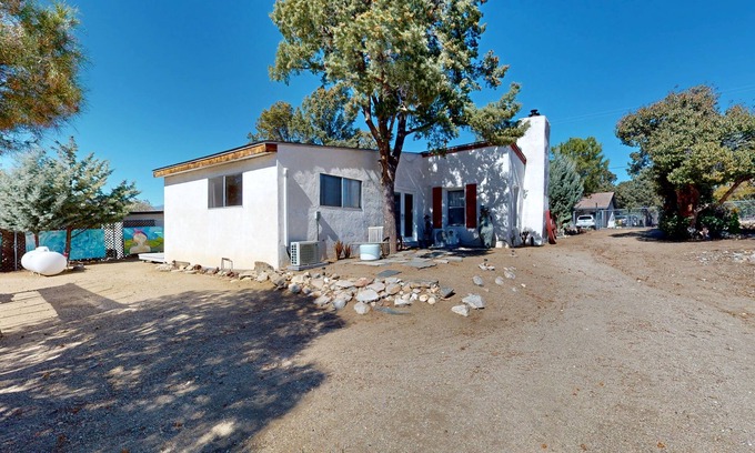 Pinyon Pines House | Cozy home with picturesque views of the mountains, a fireplace, and internet