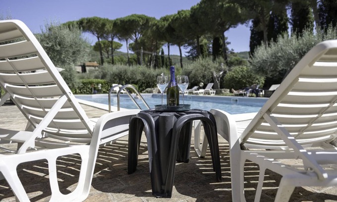 Passignano sul Trasimeno Apartment | Cozy apartment equipped with all comforts to accommodate up to 3 people. The flat is located in a renovated former period oil mill, which offers to its guests many shared services: access to the seasonal pool, small area used as a gym, playground and equ