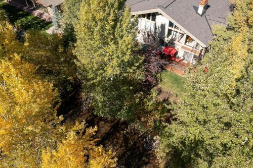 Warm Springs House | Creek Front Duplex Close to Lifts with Hot Tub