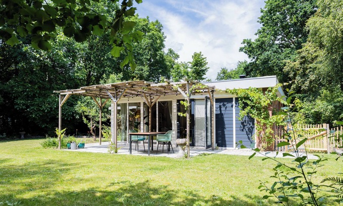 Gasselte House | De Bosuil, a cozy and luxurious detached bungalow of 60 square meters for 2 people, located in a peaceful spot within the park.