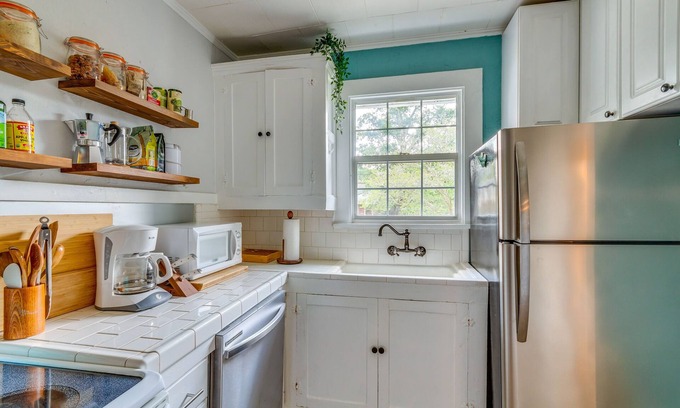 Southeast Pensacola Cottage | Deck & Grill: Downtown Pensacola Vacation Rental