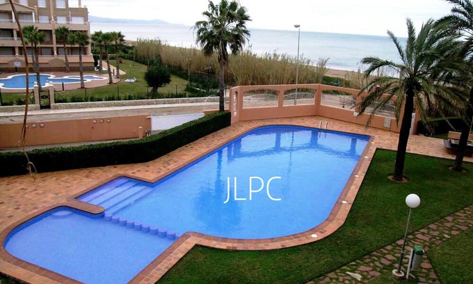 Denia Apartment | DENIA-APT IN FRONT OF THE SEA DIRECT ACCESS TO THE SANDY BEACH-WIFI-POOL-POOL-GARDEN-PARKING