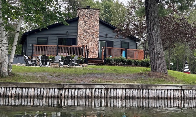 Alanson House | Devils Elbow Cottage on Crooked River with HOT TUB! Ski and Golf nearby!